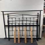 A Jay-Be brass double bed frame with side irons and slats, headboard L. 145cm H. 132cm.