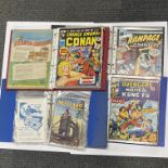 A quantity of Marvel comics.