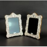 A pair of hallmarked silver wooden backed picture frames, H. 20cm.