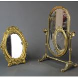 Two attractive brass dressing table mirrors, tallest H. 35cm.