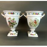 A pair of large Continental porcelain urns, H. 34cm.