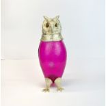 A large silver plate mounted coloured glass owl wine jug, H. 29cm.