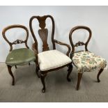 Two Victorian framed balloon back upholstered chairs together with a cream upholstered carver chair,