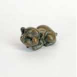 A small oriental bronze figure of a laughing pig, L. 5cm.