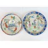 Two early 20th Century Oriental porcelain chargers, largest dia. 34cm.