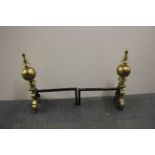 A pair of heavy brass fireplace andirons, H. 50cm.