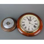 A battery operated reproduction Great Western Railway clock, Dia. 29cm together with a wall baromete