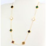 A matching 18ct yellow gold necklace set with tiger's eye, malachite, onyx, carnelian and mother