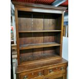 A 20th C two drawer bookshelf/ cabinet with brass handles and bone inlay, H. 212cm.