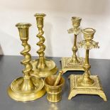 Two pairs of brass candlesticks and a small brass pestle and mortar, tallest H. 18cm.