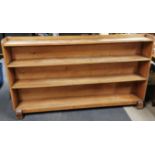 A long pine bookshelf, 178 x 100cm.