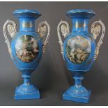 A pair of continental Sevres style porcelain urns, H. 46cm.