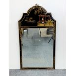 A large Chinese lacquered framed mirror, 60 x 112cm.