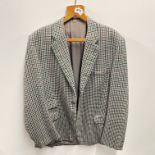 A gent's tailor made tweed jacket, shoulder W. 48cm.