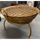 A large iron firepit and stand with grill tray and stand, W. 70cm, H. 48cm.