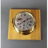 An S.E.Wills wall mounted ships style wall clock, mount size 25 x 25cm.