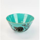 An unusual Chinese pale blue glazed porcelain bowl, Dia. 17cm. D. 9cm. hairline crack.