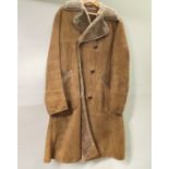 A traditional gent's double breasted sheepskin coat, shoulder W. 106cm, L. 115cm.