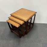 A nest of three G Plan teak tables, overall 50 x 50 x 50cm.