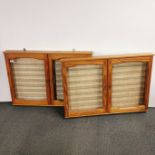 A pair of glass shelved, pine wall display cabinets, 93 x 68cm.