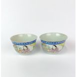 A pair of Chinese hand enamelled porcelain tea bowls, Dia. 9cm. D. 5cm. Both A/F