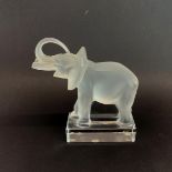 A Lalique frosted crystal elephant, H. 15.5cm. engraved Lalique France.
