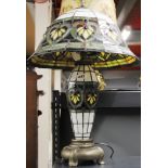 A Tiffany style stained glass table lamp and shade, H. 63cm.