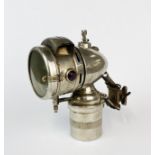 An early chromium plated carbide bicycle lamp by Herm Riemann of Chemnitz-Gablenz, H. 16.5cm.