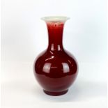 A Chinese Sang de Boeuf glazed porcelain vase, H. 30cm.