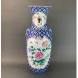 A large 19th Century Chinese hand-enamelled porcelain vase decorated with butterflies and flowers,