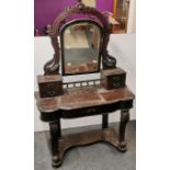 A carved stained wood mirror backed dressing table, H. 154cm W. 100cm.