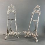 A pair of silvered brass picture easels, H. 50cm.