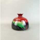 An unusual Oriental glazed stoneware narrow necked vase with splash glazed and impressed marks to