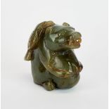 An olive green jade figure of a bear with a bird on its back, H. 5.5cm.