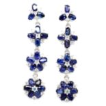 A pair of 925 silver drop earrings set with oval cut sapphires and white stones, L. 5.5cm.