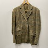 A gent's tailor made woollen tweed jacket, shoulder W. 46cm.