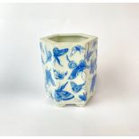 A Chinese hexagonal porcelain brush pot decorated with butterflies, H. 15cm. Four character mark