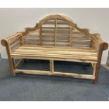 A lovely light hardwood three seater bench, L. 165cm H. 105cm.