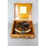 A wooden cased German sextant with notations inside lid for 1922, case size 33 x 30 x 14cm.