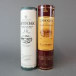 A bottle of Glenmorangie single malt whiskey together with a bottle of Laphroaig single malt