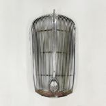 A vintage motor car radiator grill, H. 79cm.