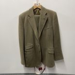 A gent's tailor made two piece woollen suit, shoulder W. 46cm, waist size 84cm.