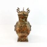 A Chinese archaic form bronze vase and cover, H. 28cm.