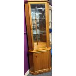 A Sutcliffe Furniture teak corner cabinet with mirrored interior, H. 183cm.
