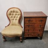 An upholstered balloon back nursing chair together with a chest of drawers, chest 81 x 60 x 44cm.