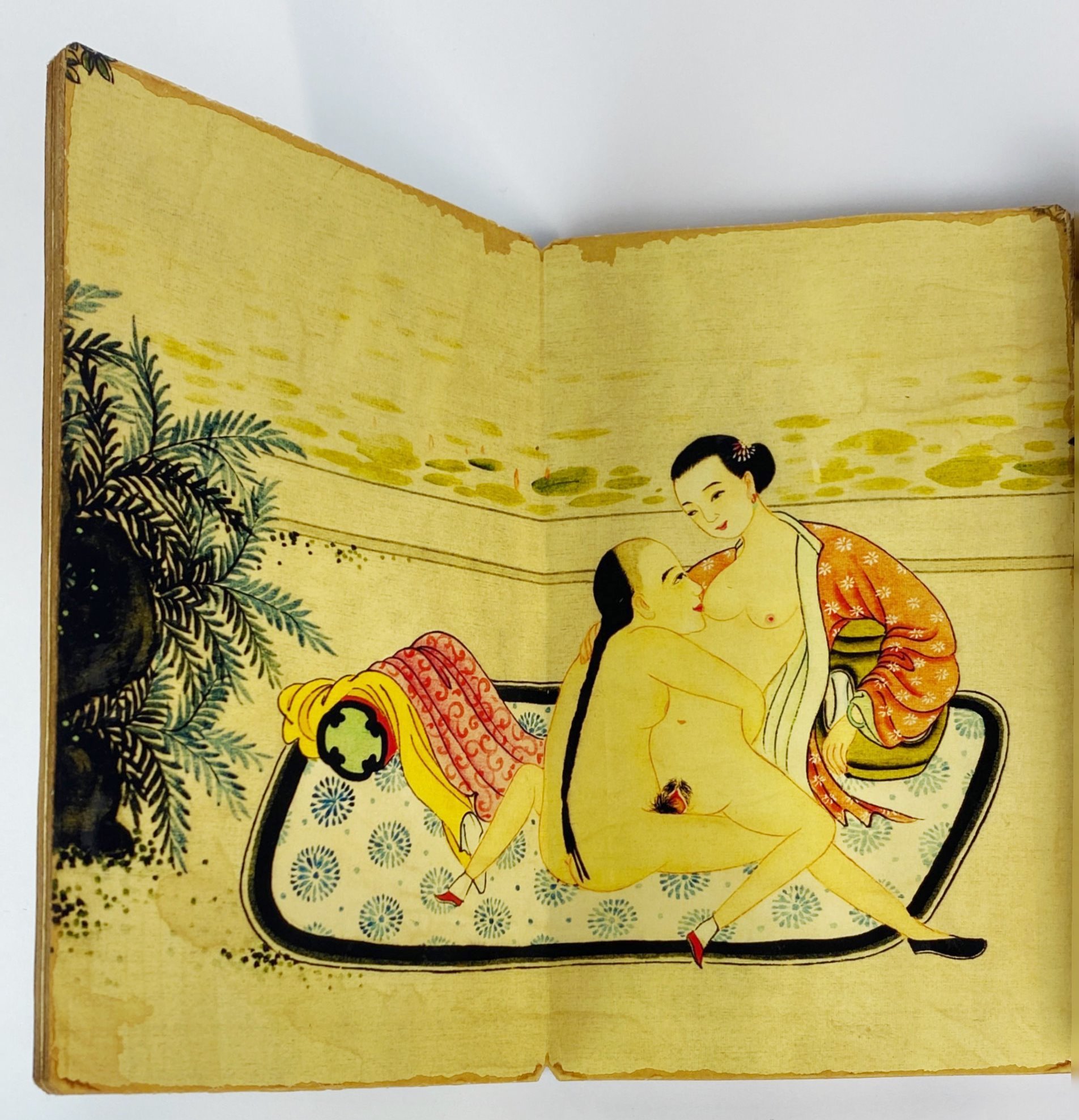 A Chinese folding book of erotic pictures, 12 x 18.5 x 3cm.