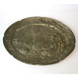 An Art Nouveau relief decorated pewter tray, W. 41cm.