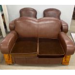 A superb Art Deco re-upholstered three piece suite, settee W. 140cm.