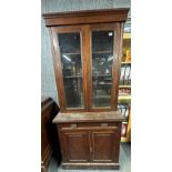 A 20th C mahogany single drawer display cabinet, H. 207cm W. 92cm.