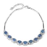 A 925 silver bracelet set with oval cut sapphires and white stones, L. 17cm.